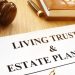 Living trust and estate planning form on a desk.