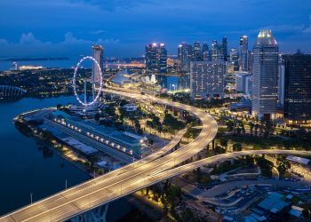 Aerial view of Singapore business district and city at twilight in Singapore, Asia